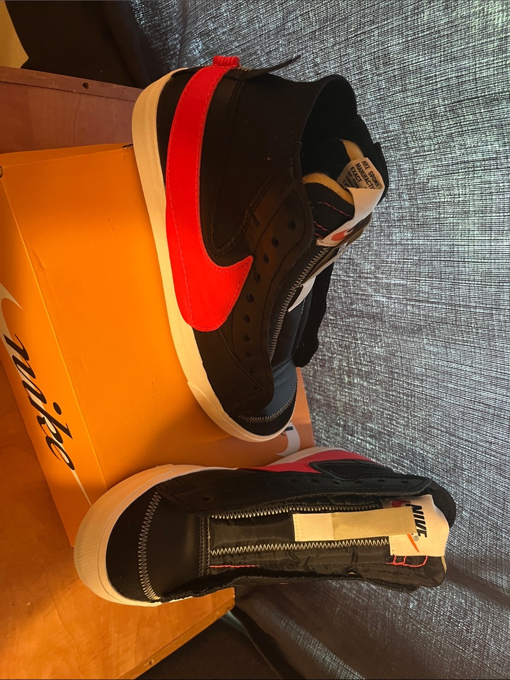 Nike Black Low-Top Sneaker with Bright Red Swoosh